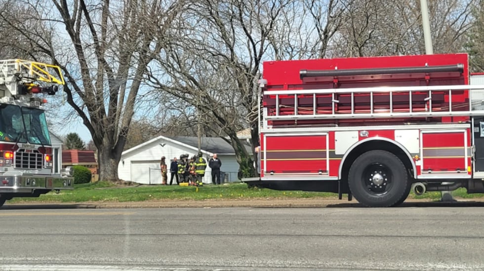 Car through building on Washington Ave.