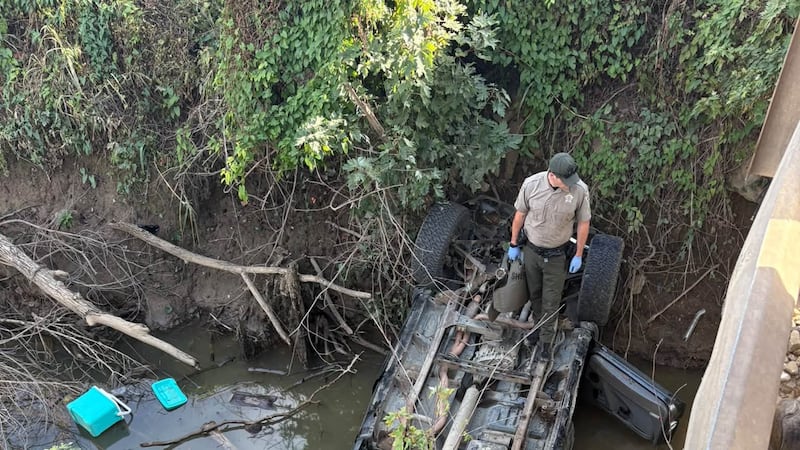 Spencer Co. crews respond to truck upside down in creek