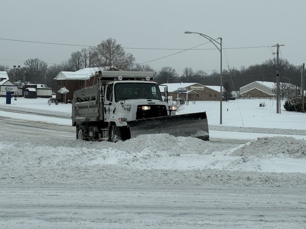 Snow plow on First Ave. around 9 a.m.