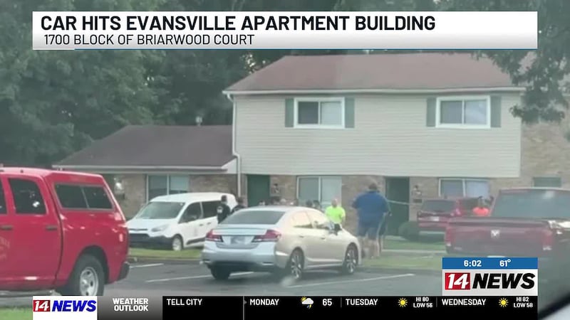 Car hits apartment building in Evansville